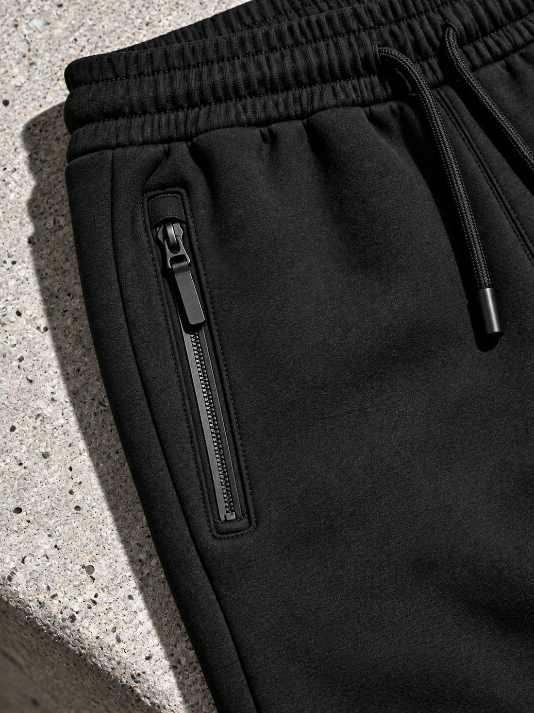 Jogger Tech Fleece noir, poche zippée